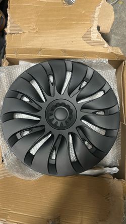Tesla hub caps / Tesla sun block visor