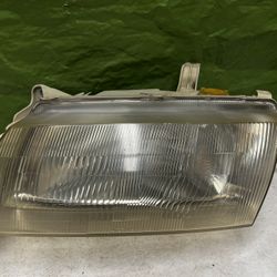 97 - 98 Mazda Prtotege Headlight Headlamp Assembly Driver Side