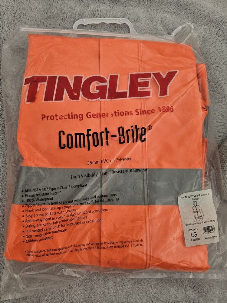 RAIN COAT AND SAFTEY VEST NEW IN PACKAGING