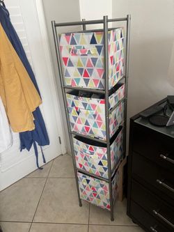 Four drawer standing storage bins .. 54” high , 12 x 12 square $40
