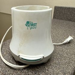 The First Years Simple Serve fast baby bottle warmer and sanitizer.