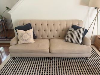 Beige tufted linen couch