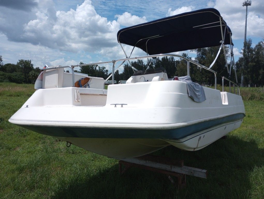 18 Deck Boat With 90 Hp Outboard