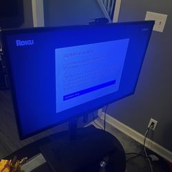 32 Inch Sony TV  W/ Roku And Mounted Stand