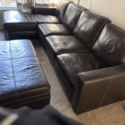 Leather Sectional With Storage ottoman