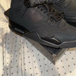 Black Cat Jordan 4s