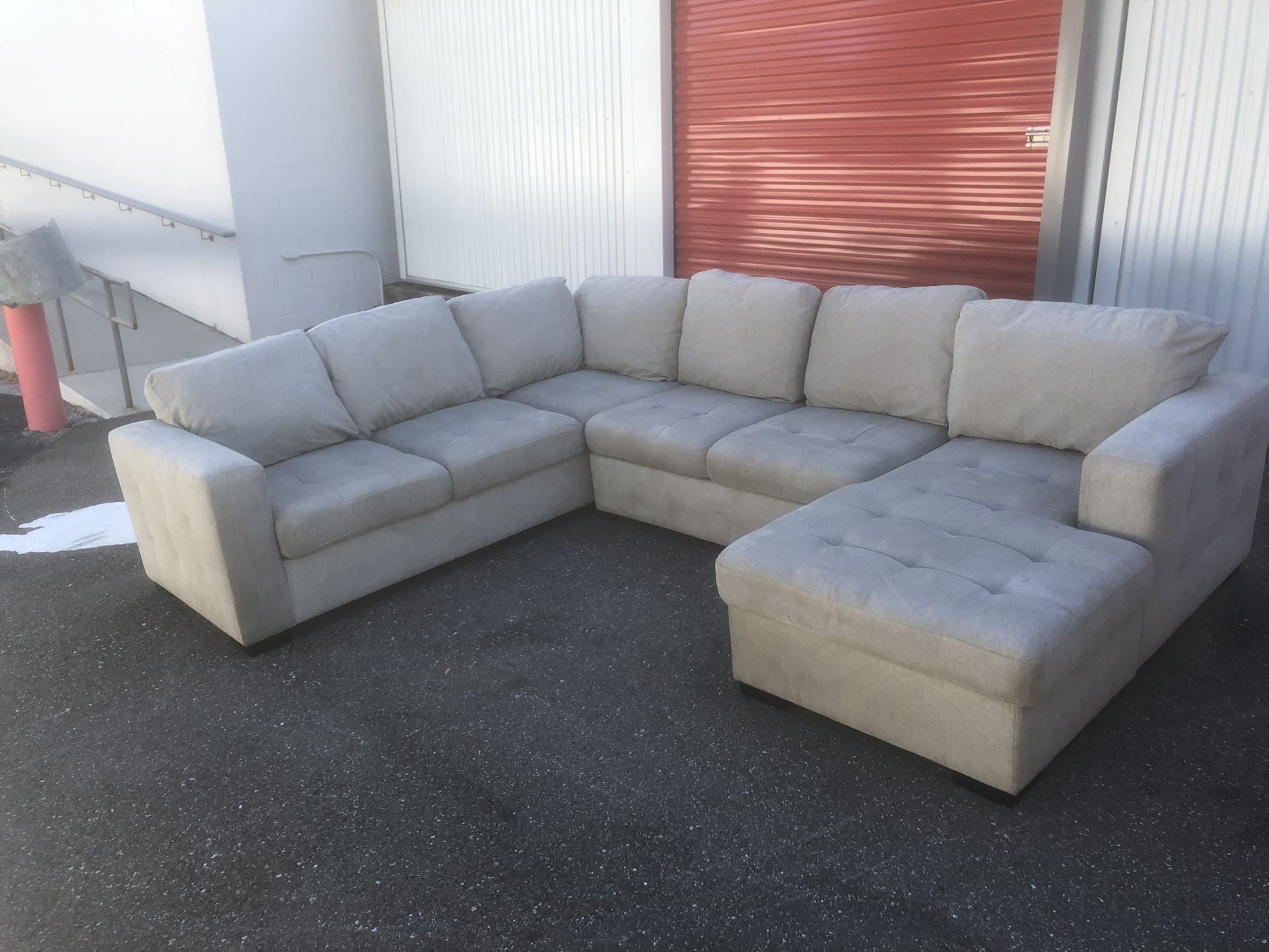 Sectional Couch With Storage And Pull Out Ottoman