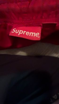 red supreme shorts