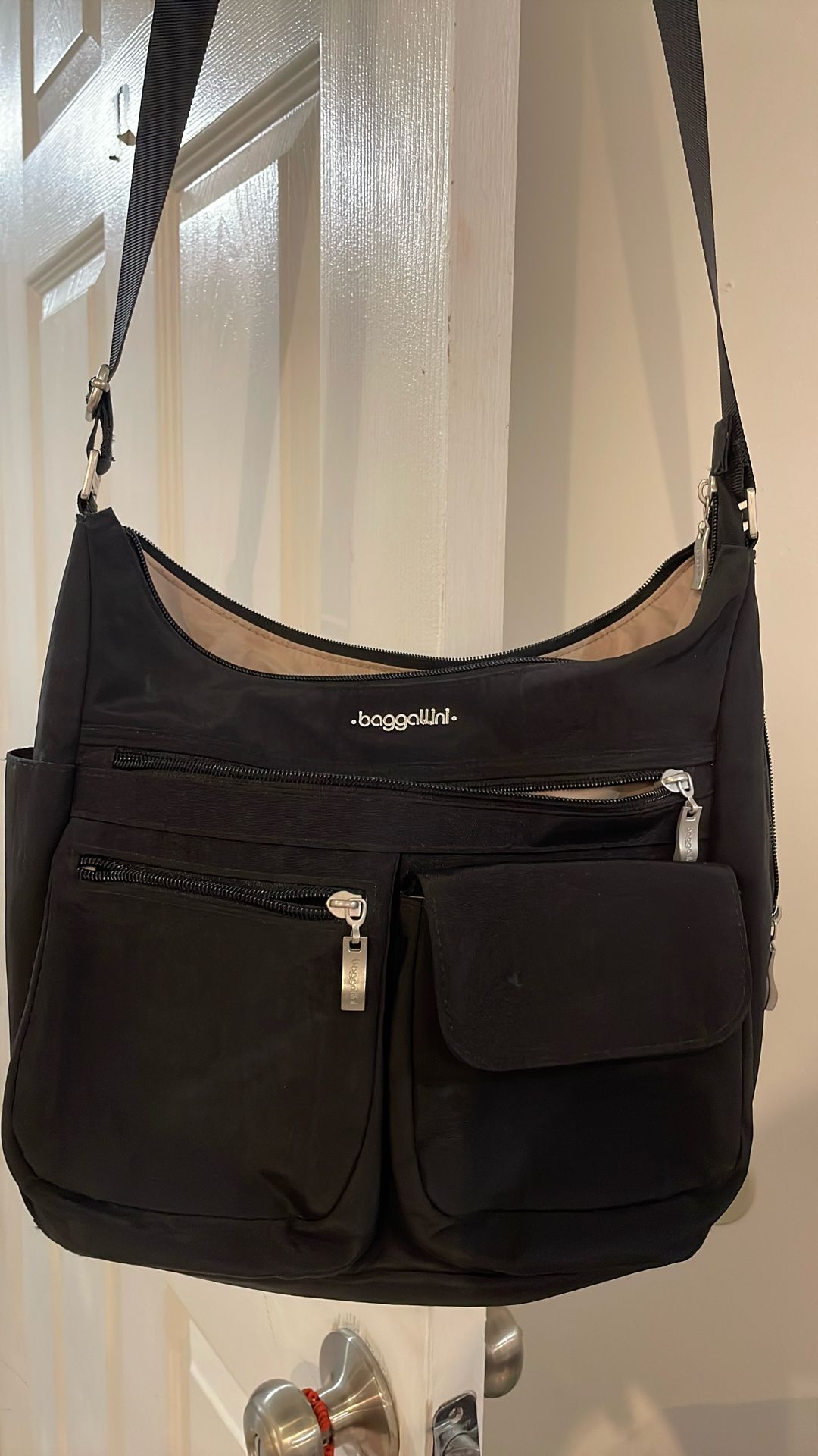 Barggallini everywhere bag, black raincoat like material seven pockets