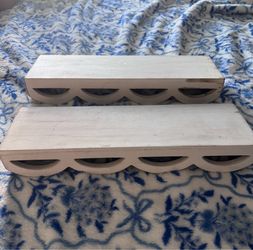 Wooden scalloped white shelves
