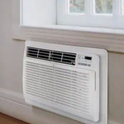 LG 9,800 BTU 230/208-Volt Through-the-Wall Air Conditioner Cools 450 Sq. Ft. with Heater and Remote in White. Retails $760 With Taxes!