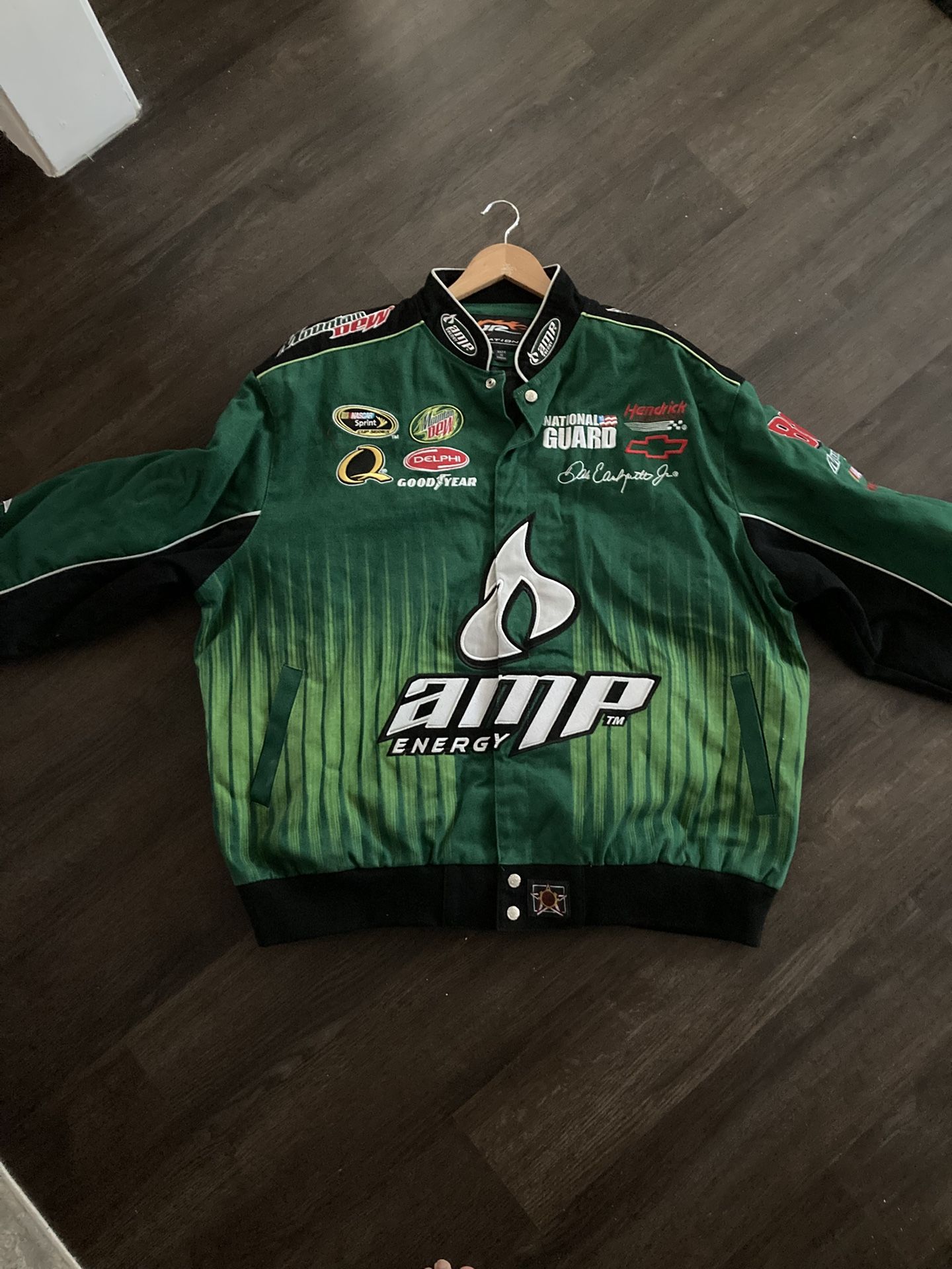 Green and black NASCAR racing jacket #NASCAR
