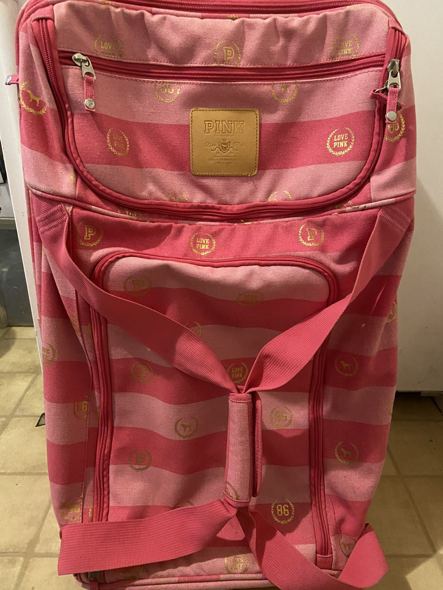 Pink Rolling Luggage Bag