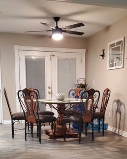 Round Glass Top Dining Table with 6 Chairs