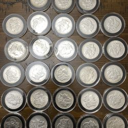 28 Morgan Silver Dollars