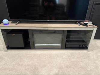 Entertainment center with electric fireplace