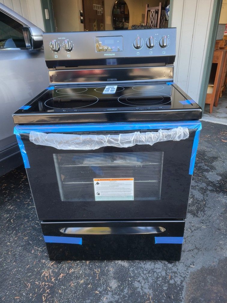 Brand New- Frigidaire Electric Black Stove with 5 Burners.