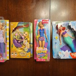 Various Barbie and Disney Dolls - all four factory sealed and unopened BNIB