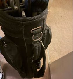 Ping irons, drivers, putter, bag and three wheel trolly
