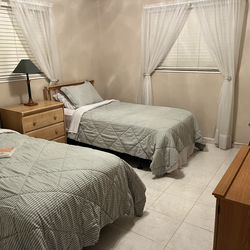 2 Twin beds with night table