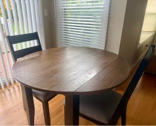 Adjustable 42 inch round two seated kitchen table