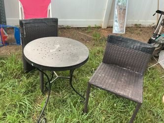 Two good patio chairs with a round patio table (all for $15
