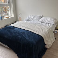 Queen Sized Mattress With Two Pillows 