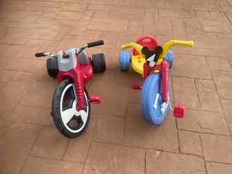 Two kids tricycles