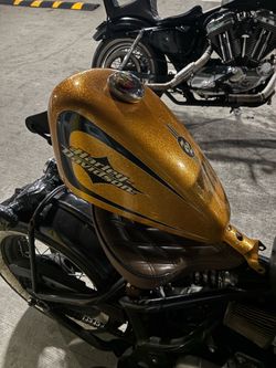 2016 Harley Sportster 72 gas tank, TC Bros Sportster mid controls, Prism Supply sissy bar, Lowbrow brass 1” grips dual or single cable throttle, Zombi