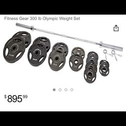 Olympic Bar Plus Set Of Weights 