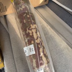 Brand new still in a bag area rug size 8/10