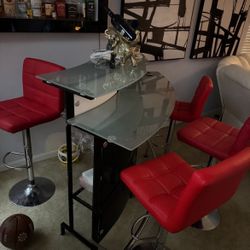 bar with 4 red chairs
