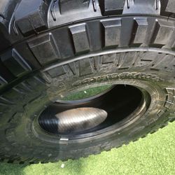 1 TIRE 40-13-50R17 TIRE $350