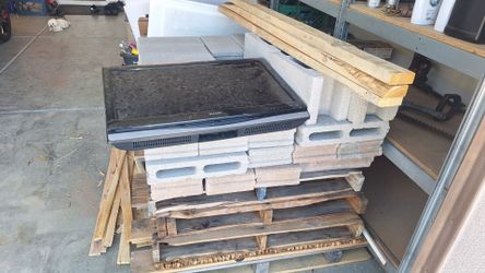 Free pallets, cement block, and TV