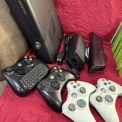Two Xbox 360 Consoles with Controllers