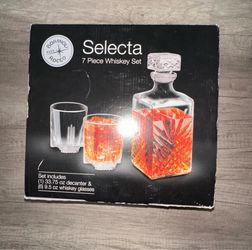 Whiskey bottle and glass set