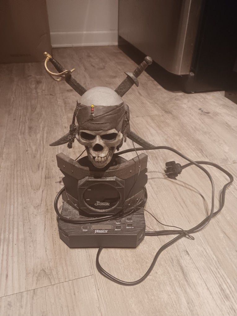 Pirates of the Caribbean Alarm Clock Radio Talking Skull Swords Disney Works