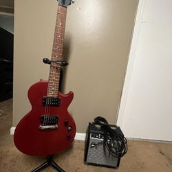 Electric Guitar With Amp And Stand
