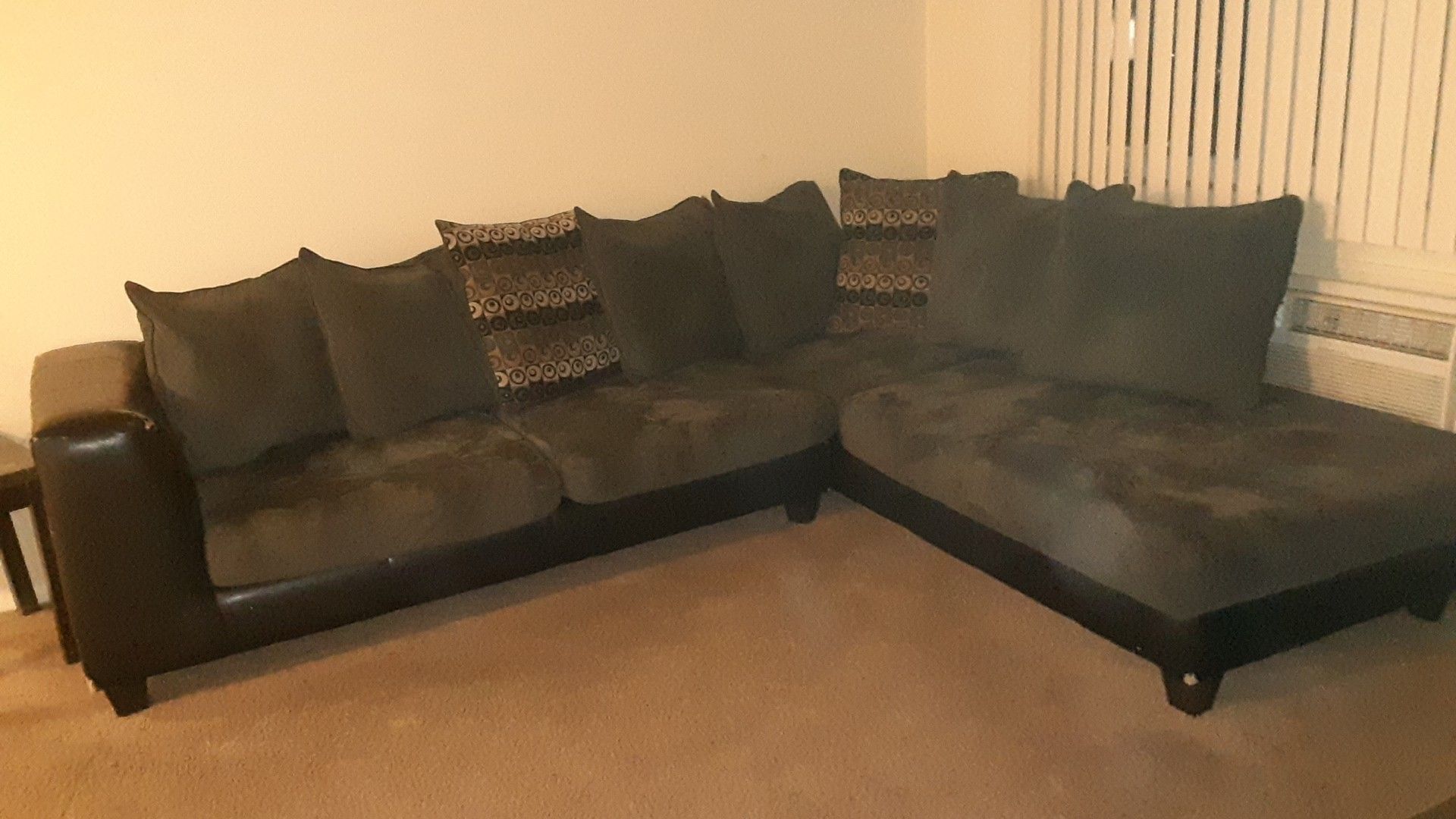 Black and grey sectional still look fine no pets or nun so none of that to worry about couch is nice a lil wear and tear but still decent best offer