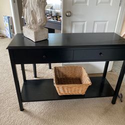 Black side entry sofa table with drawers