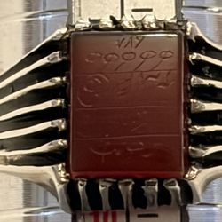 handmade men's ring, typically crafted from 925 sterling silver and featuring a red agate