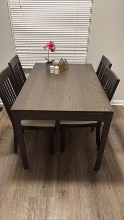 IKEA extendable dining table and 4 chairs