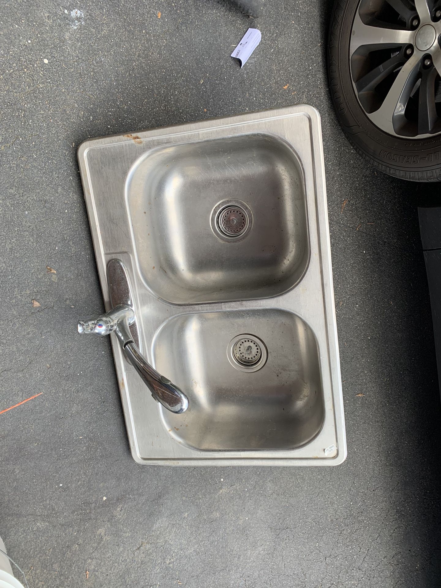 Kitchen sink with stainless steel mixer tap
