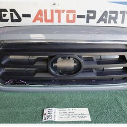 w/damages 2016 - 2017 - 2018 - 2023 TOYOTA TACOMA FRONT GRILLE OEM AY29484 w/o emblem