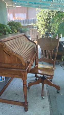 Oak roll top desk with chair