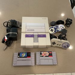 SNES console with Mario world Super Nintendo
