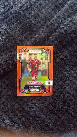 2026 Panini Prizm Monopoly World Cup Eden Hazard Orange Prizm 011/149