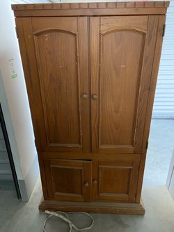 Good condition Tv brown hutch.