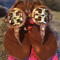 Used Tory Burch  size   10  1/2  brown leather heels 