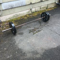 Olympic Barbell And 4 45 Lb Olympic Plates